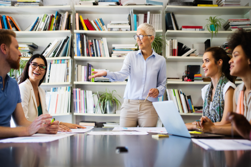 Woman leading collaborative team in an informal working space